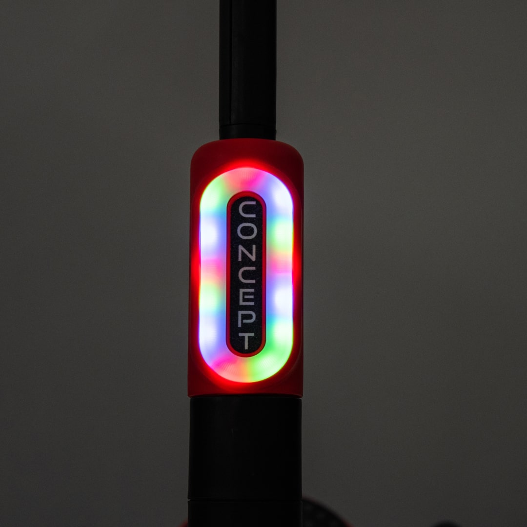 Monopattino Deluxe Elettrico per Bambini + Casco e Ginocchiere Luci a led