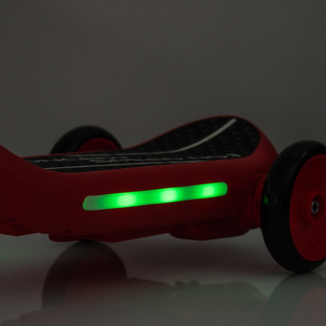 Monopattino Deluxe Elettrico per Bambini + Casco e Ginocchiere Luci a led