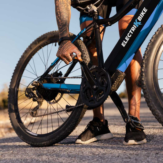 close up on person with electric bike