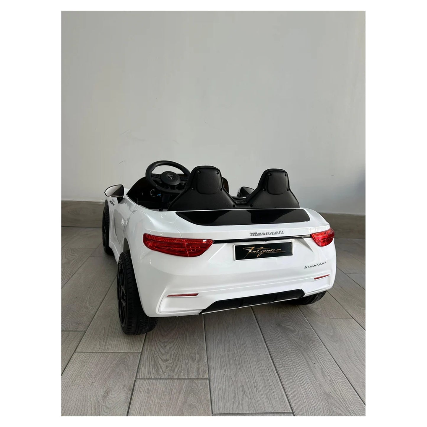 Maserati Folgore Auto Elettrica 2 Posti per Bambini 12V con Telecomando Parentale, Sedile in Pelle, Luci LED, Porte Apribili e Sospensioni FULL OPTIONAL