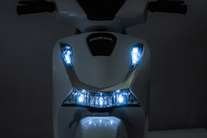 Honda SH125 FULL Motorino Elettrico per Bambini 12V con Luci LED, Ruote EVA e Bauletto Portaoggetti