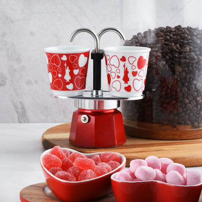 Bialetti Mini Express Cuore 2 Tazze Moka – Caffettiera con Tazzine Incluse, Set Regalo Coppia, Alluminio Originale, Gas No Induzione